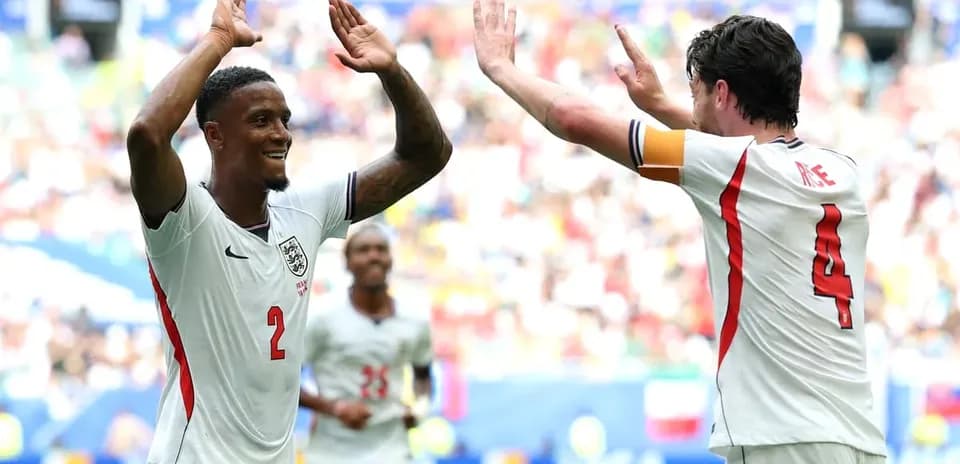Two players celebrating a goal during match