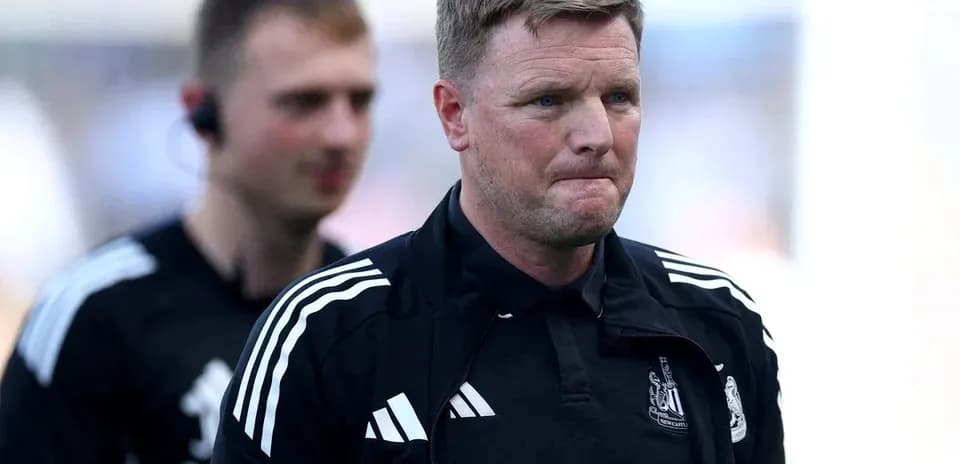 Manager walking off the pitch after match