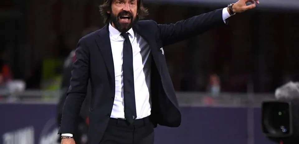 Coach gesturing passionately during a match