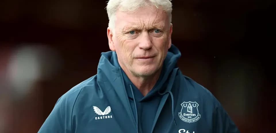 Manager in Everton jacket during match preparation