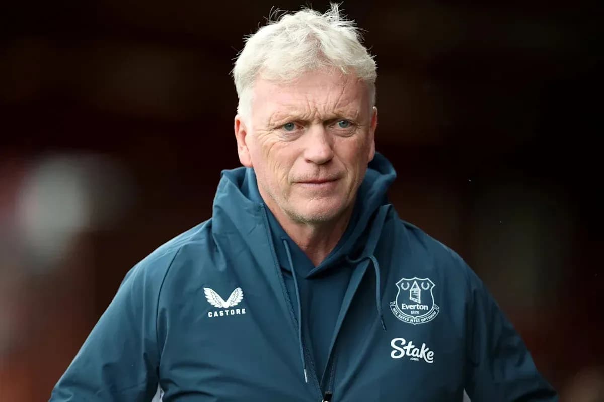 Manager in Everton jacket during match preparation