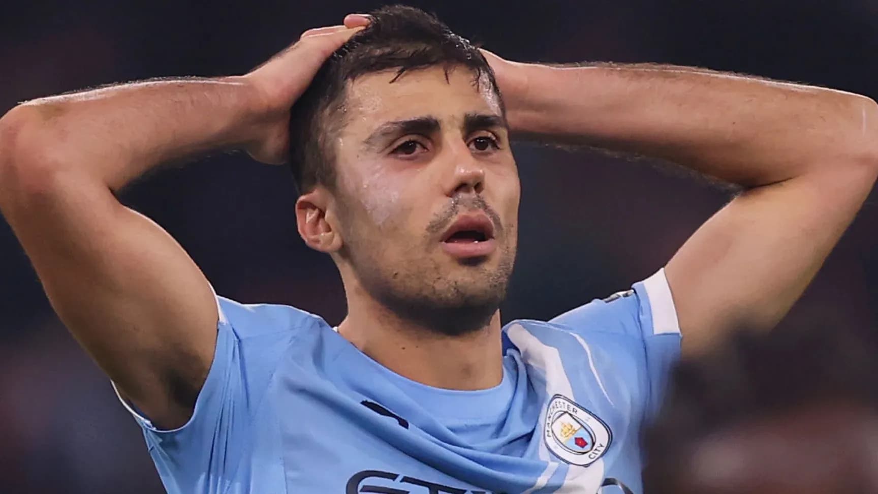 Player holding head in frustration during match