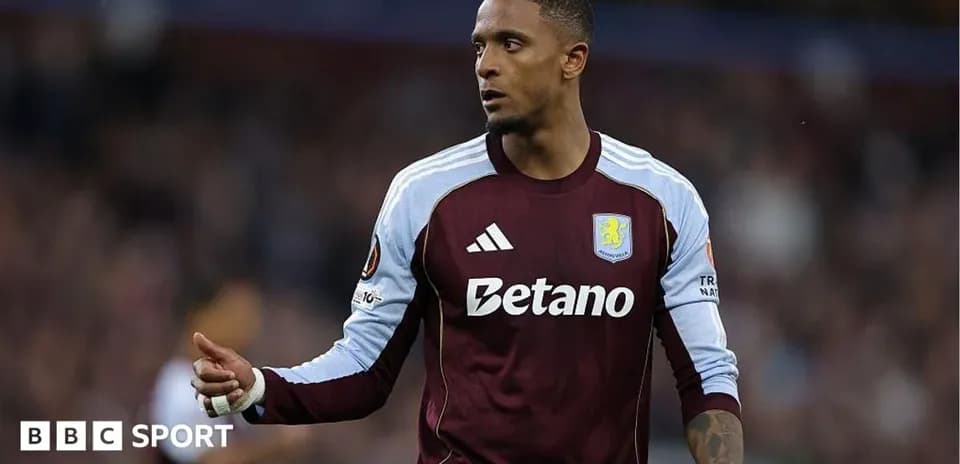 Player gesturing during match in Aston Villa kit