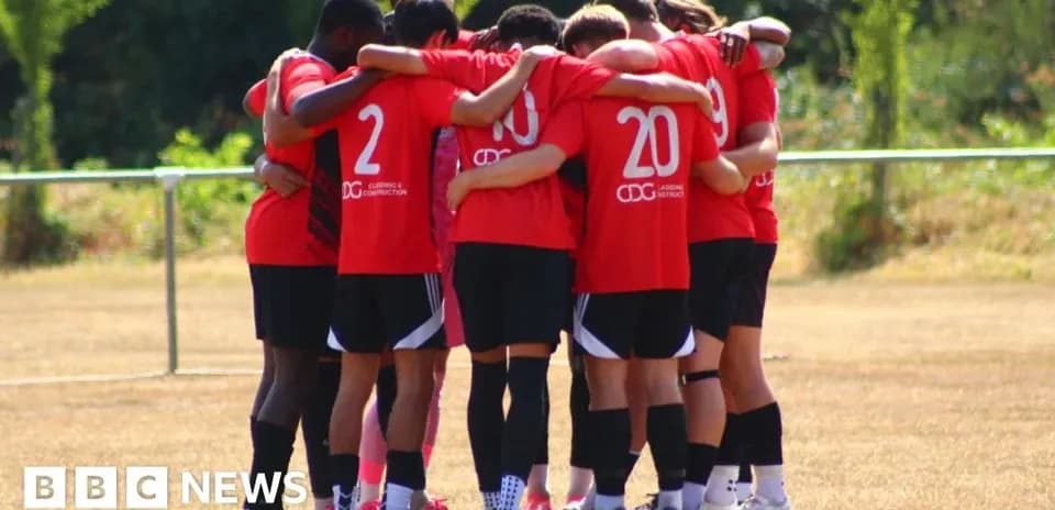 Players huddled together during team meeting