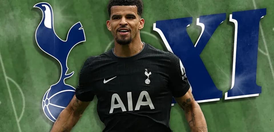 Player in Tottenham kit celebrating on the pitch