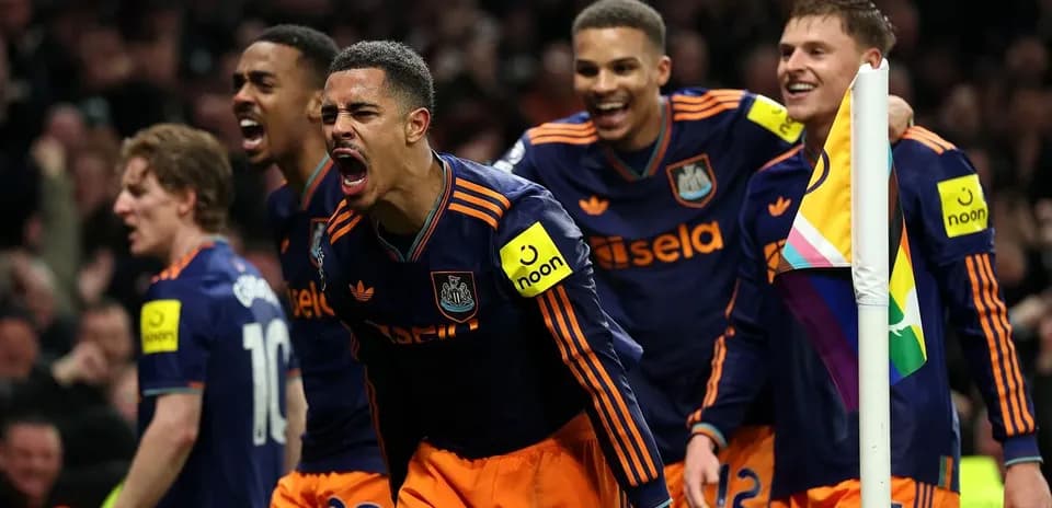 Newcastle players celebrating a goal during match