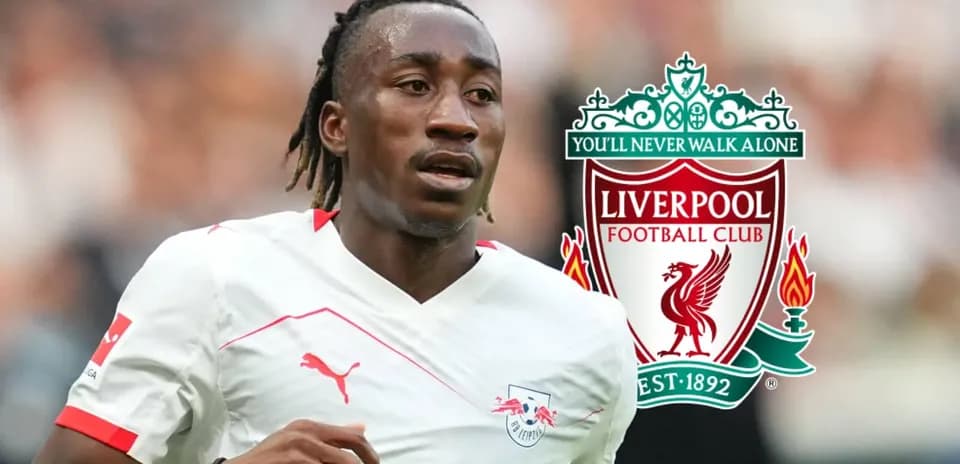 Player in action with Liverpool logo in background