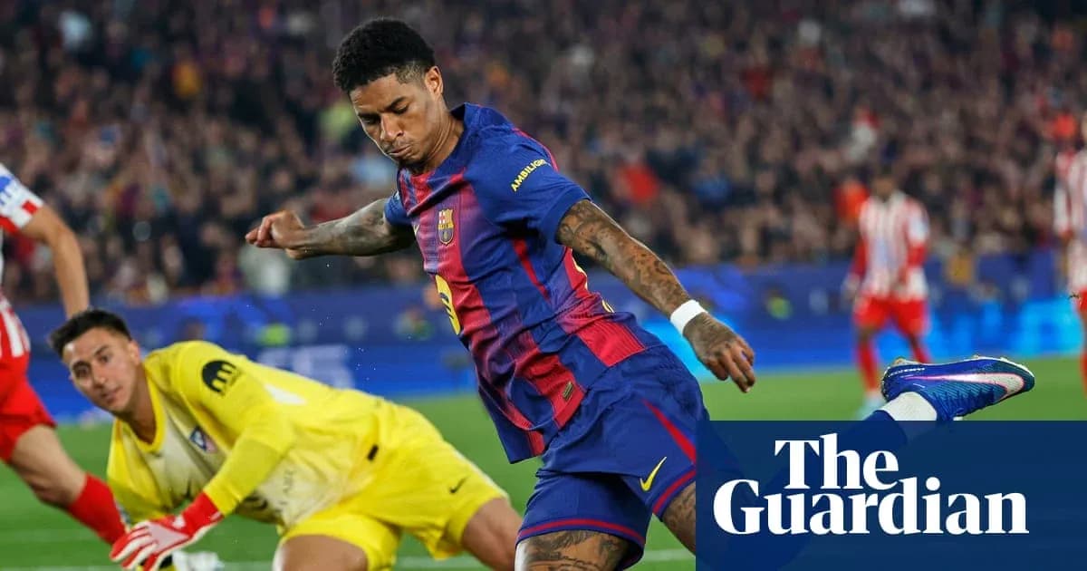 Barcelona player shooting on goal against goalkeeper
