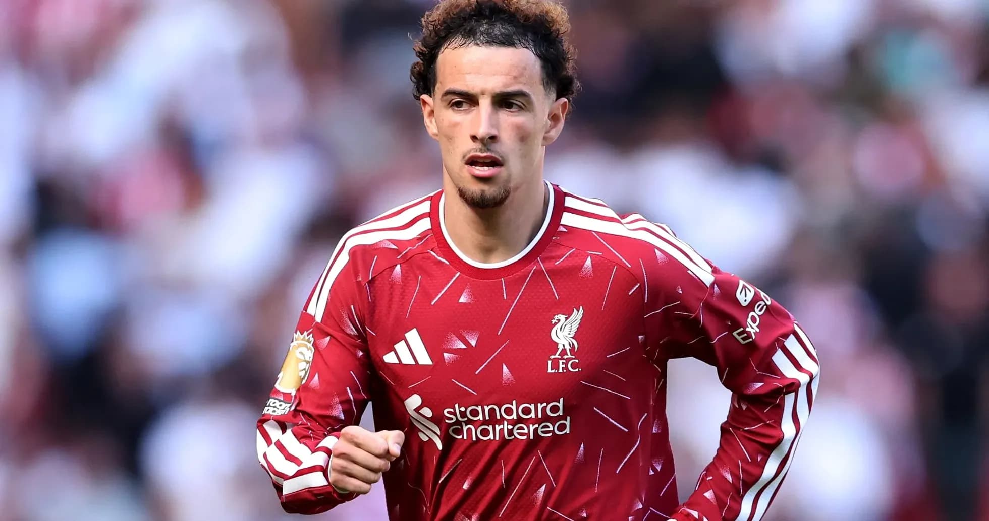 Player in red Liverpool kit during match