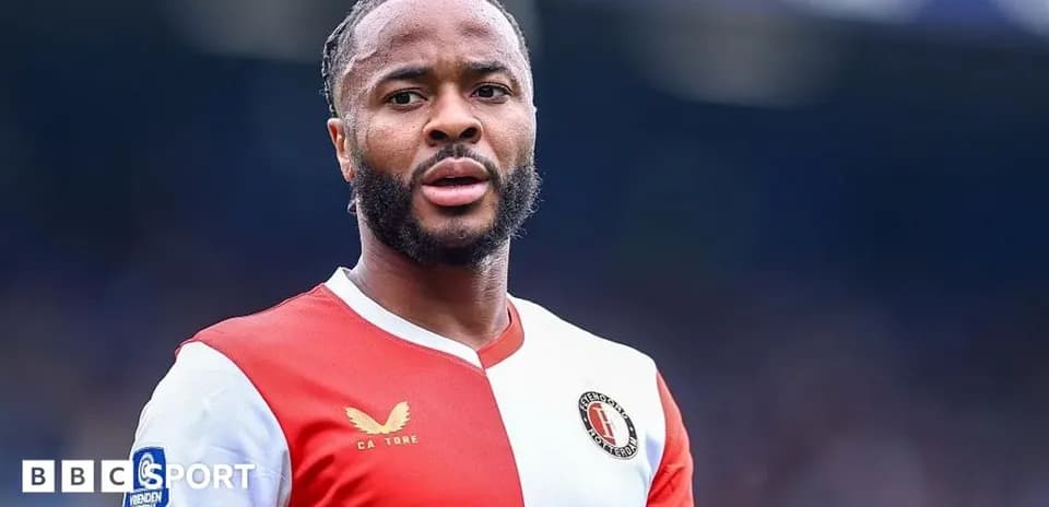 Football player wearing Feyenoord jersey on field
