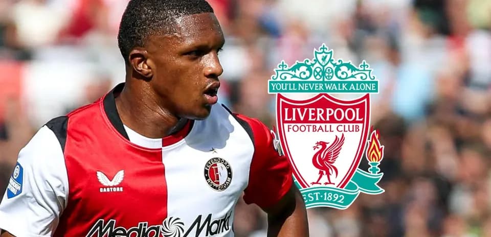 Feyenoord player in action with Liverpool logo