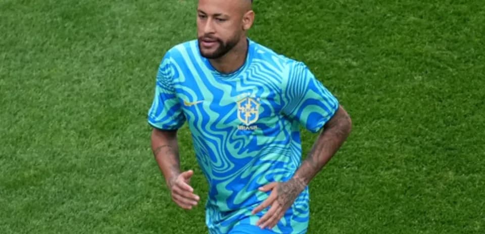 Player in blue Brazil jersey running on field