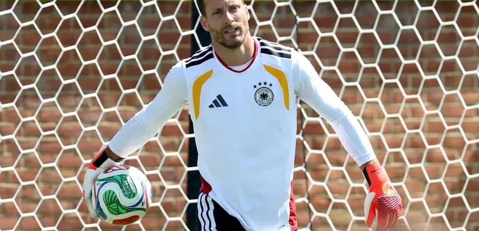 Goalkeeper holding a ball in training session