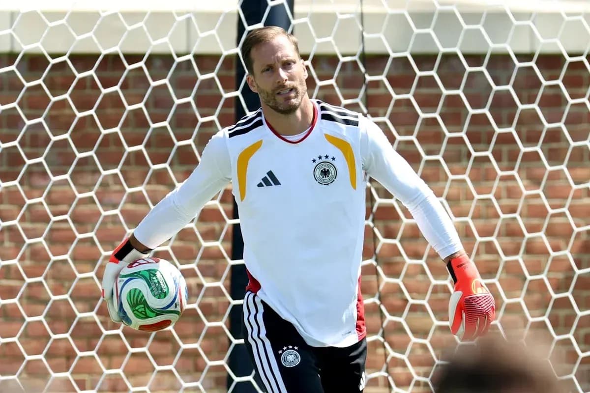 Goalkeeper holding a ball in training session