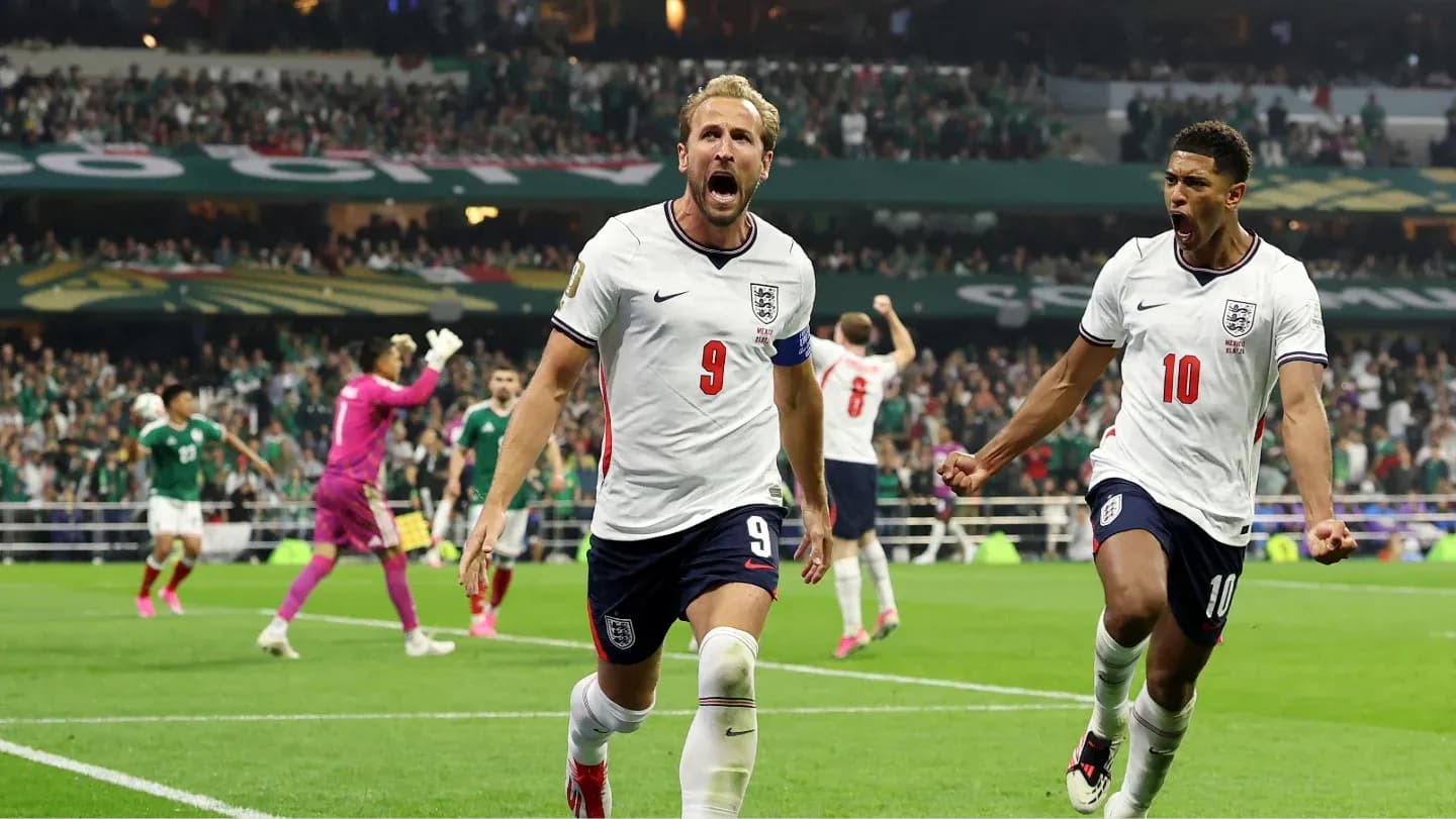 Harry Kane and teammate celebrating a goal