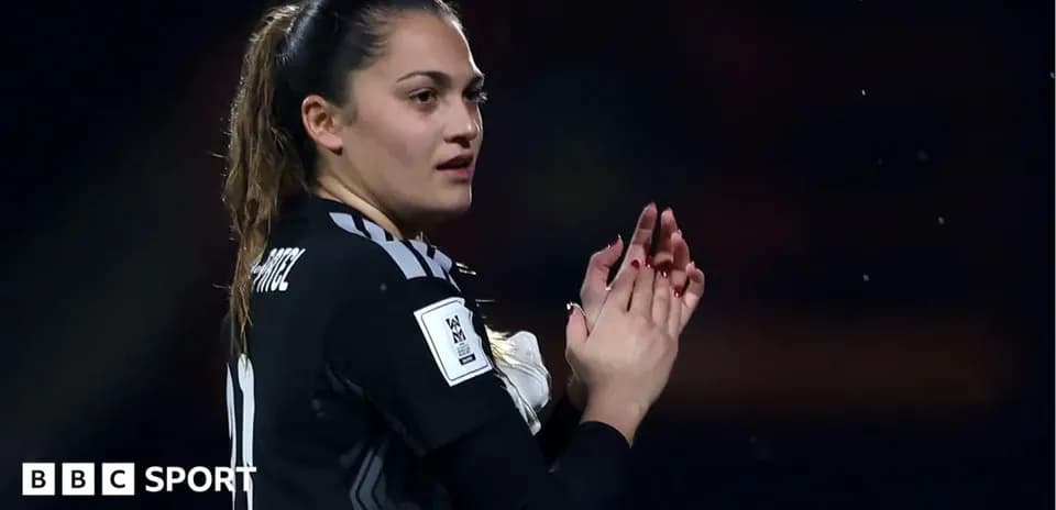 Goalkeeper applauding fans during match celebration