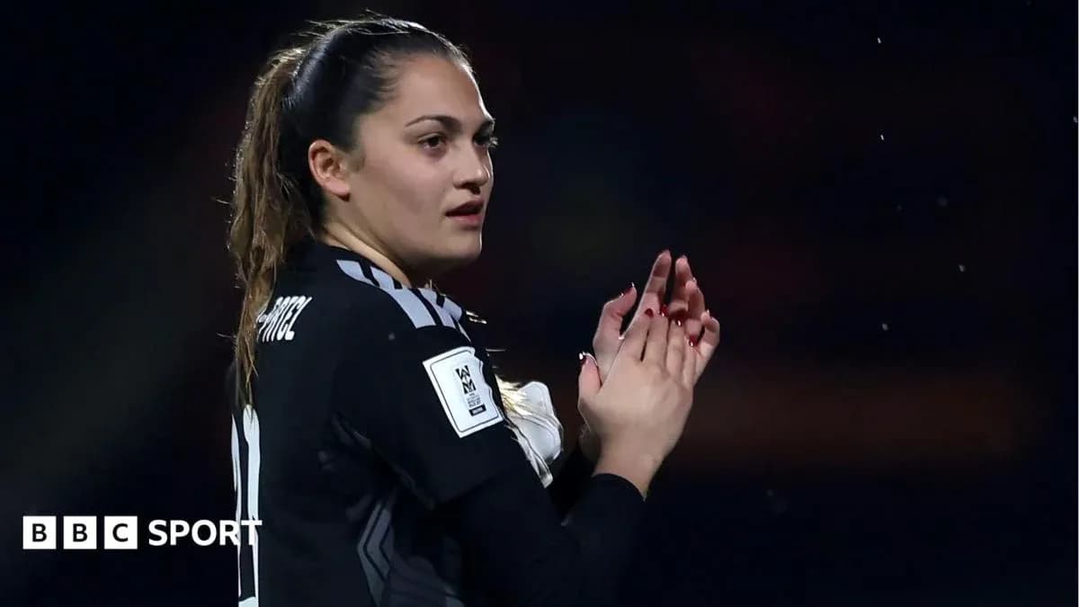 Goalkeeper applauding fans during match celebration