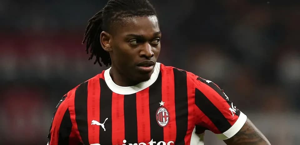 Player in AC Milan jersey during match
