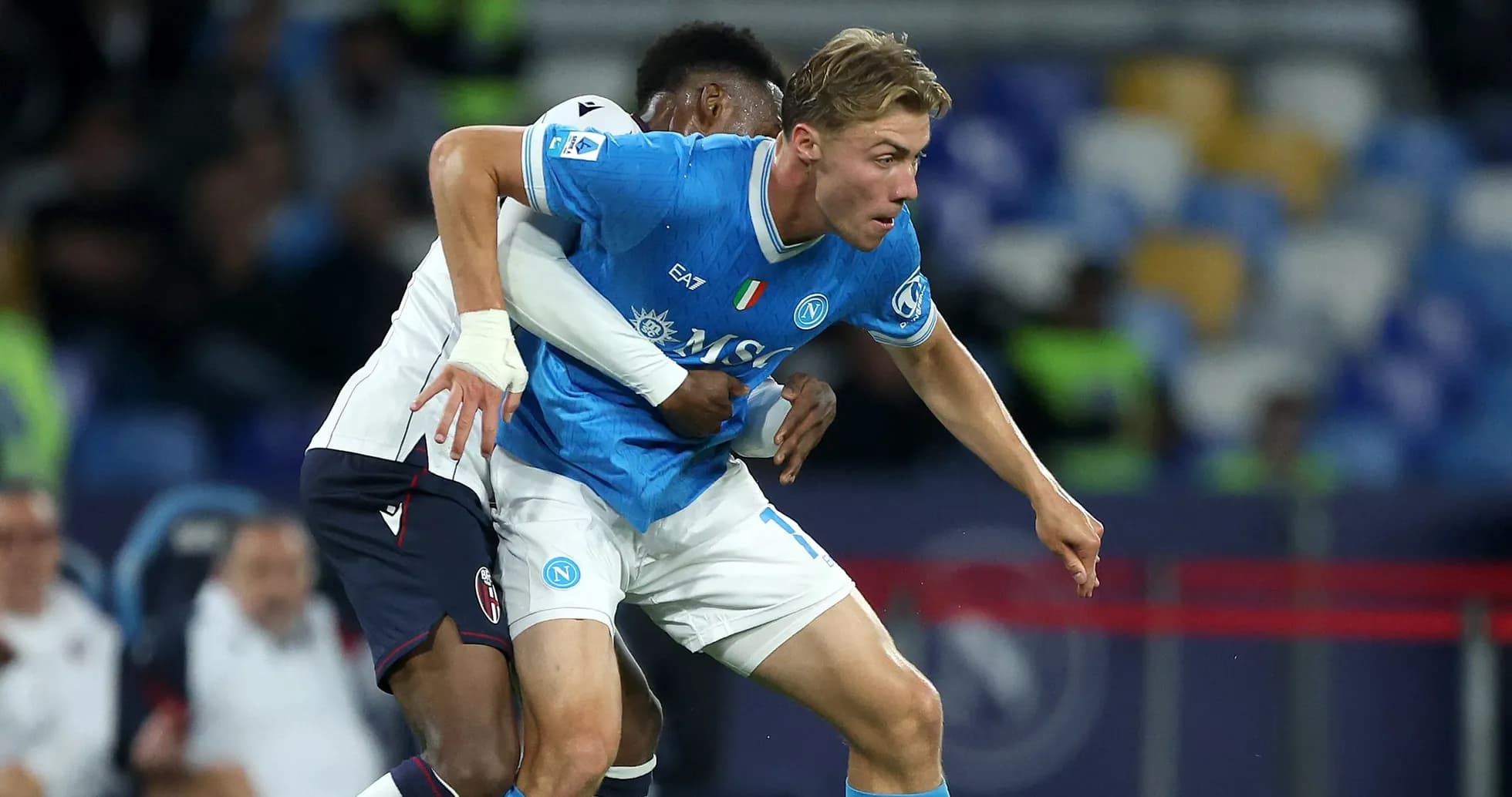 Napoli player being challenged during a match