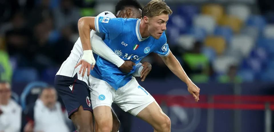 Napoli player being challenged during a match