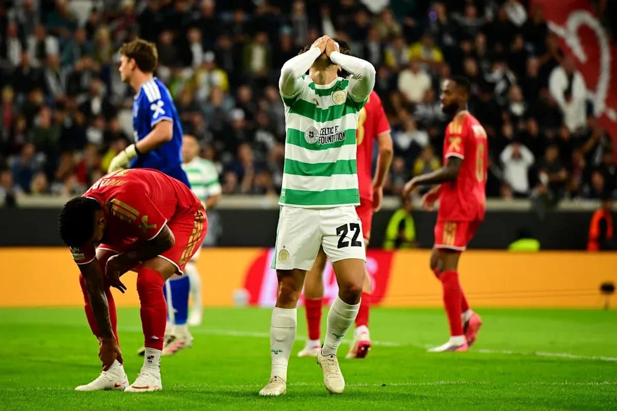 Celtic player reacts after missed opportunity during match