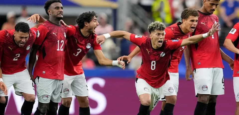 Egyptian players celebrating during a football match