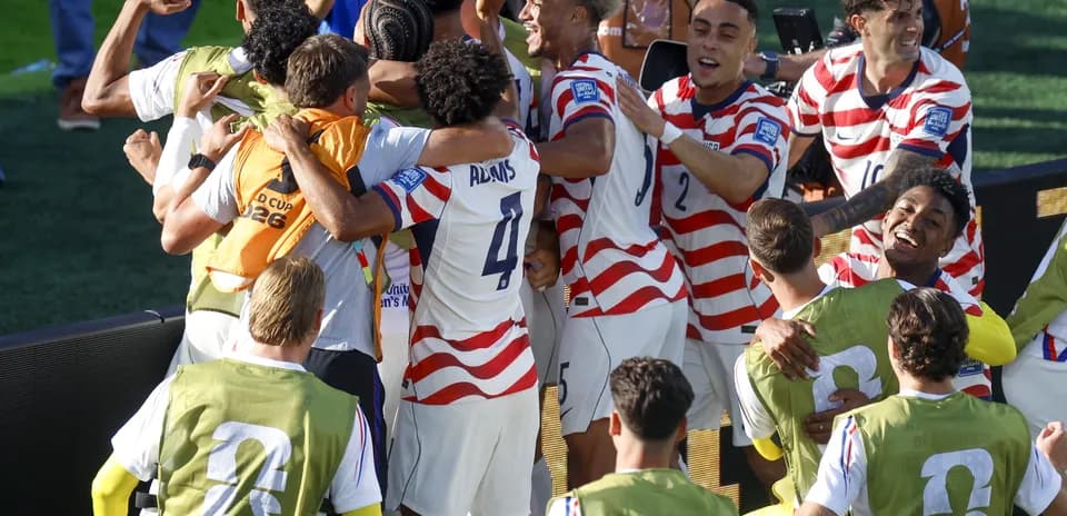 USA players celebrating goal during World Cup match