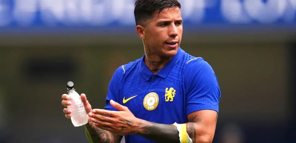 Player holding water bottle during training session