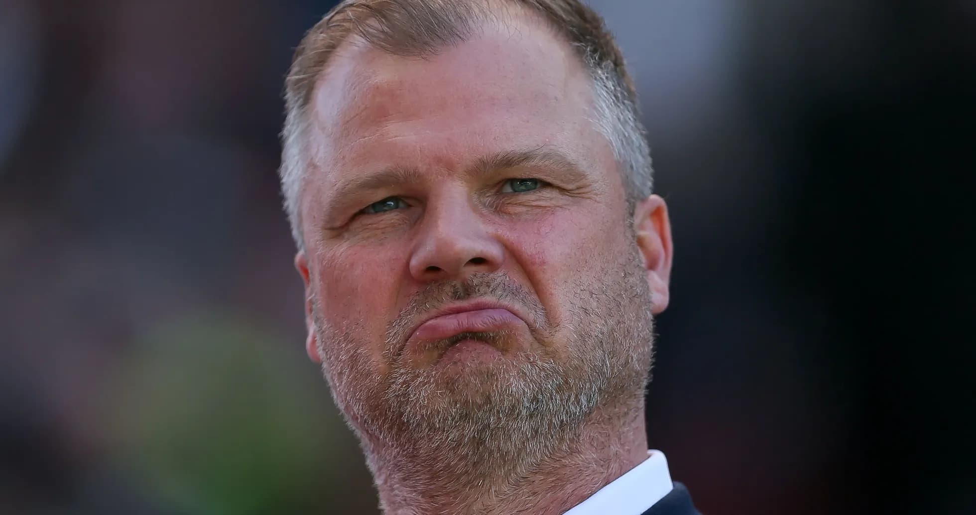 Man with serious expression during a match