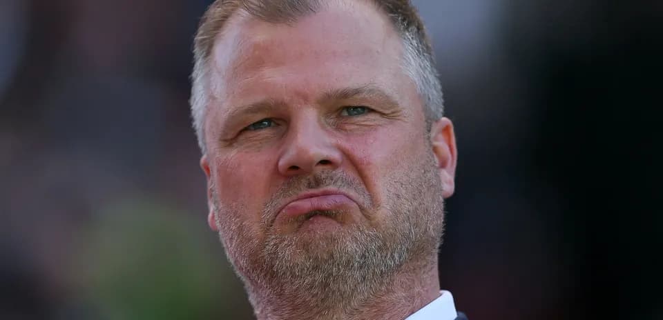Man with serious expression during a match