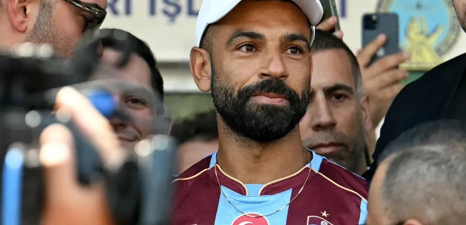 Football player in Trabzonspor jersey at event
