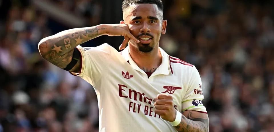Player celebrating with hand gesture during match