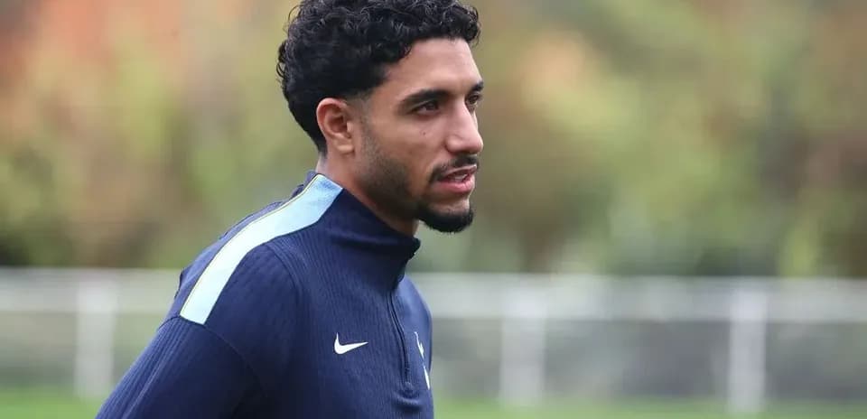 Player training on field with blurred background