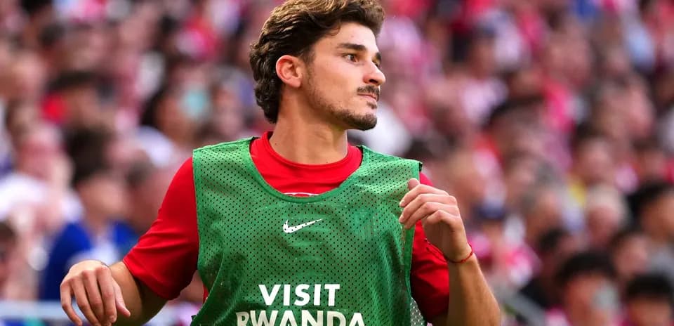 Player in warm-up jersey during match preparation