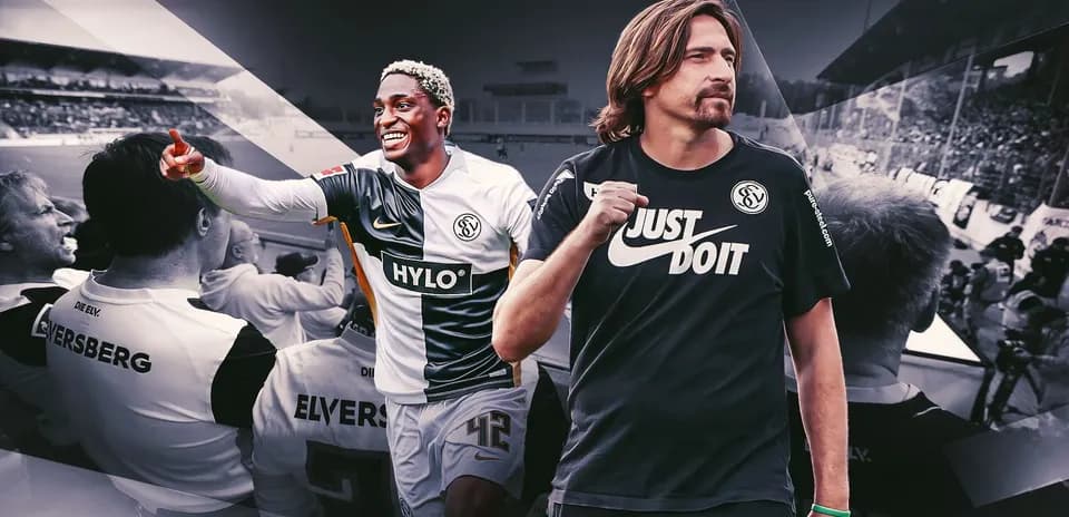 Player celebrating goal with fans in background