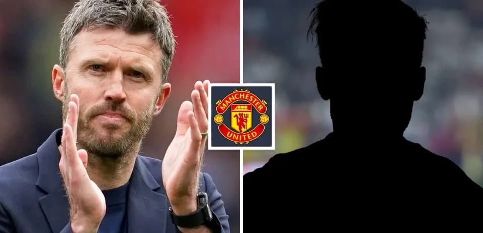Coach applauding with Manchester United logo displayed