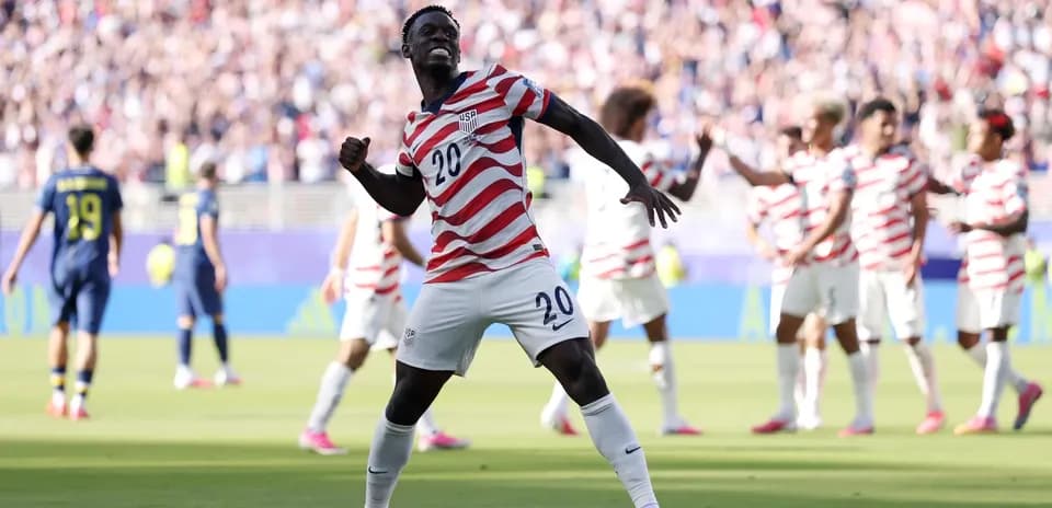 USA player celebrating during match against Belgium