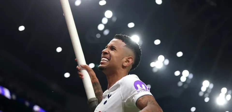 Player celebrating with a pole during match