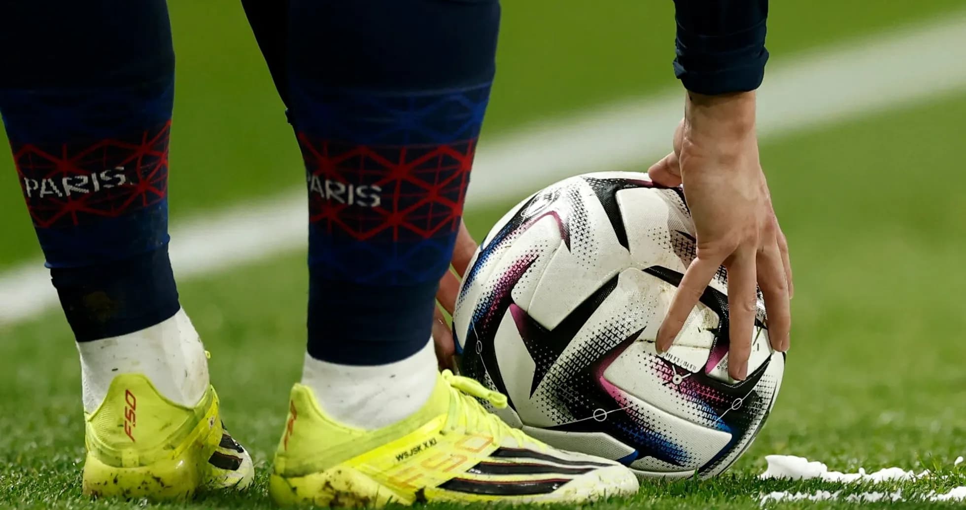 Player placing ball for a free kick