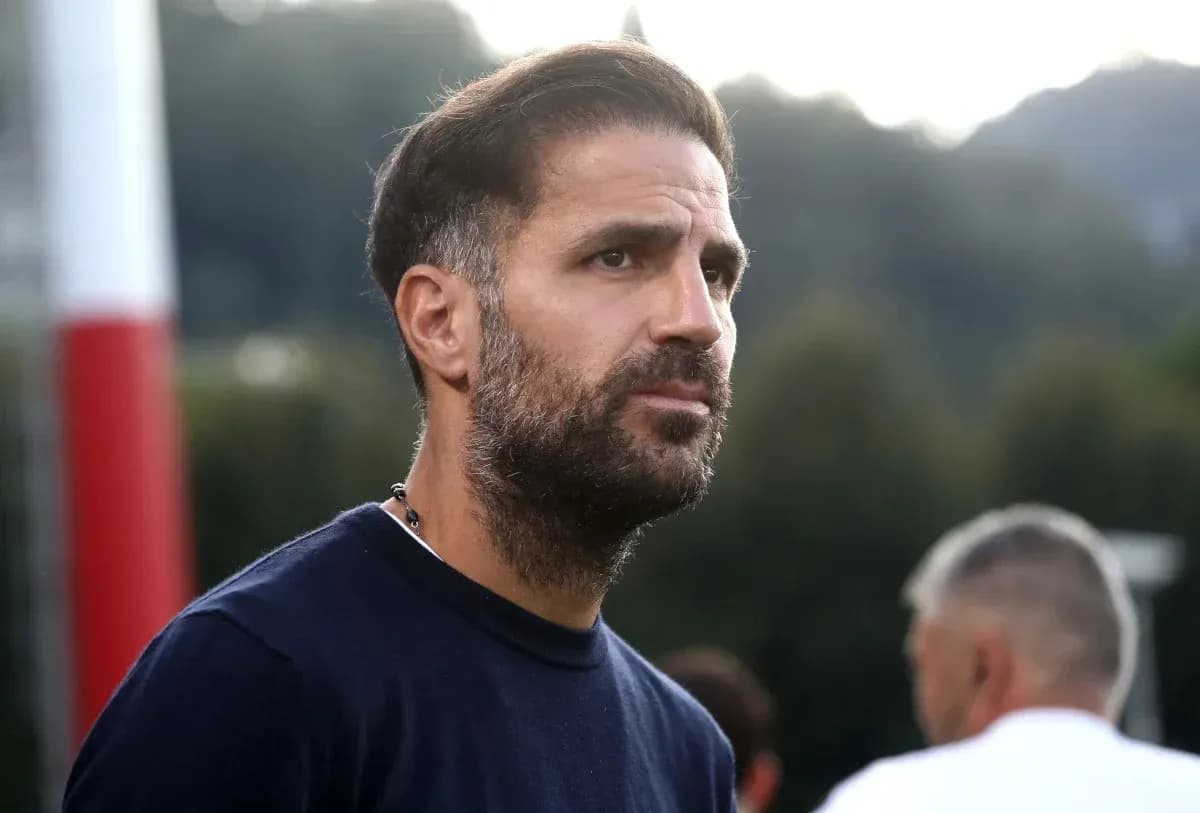 Man with beard observing training session