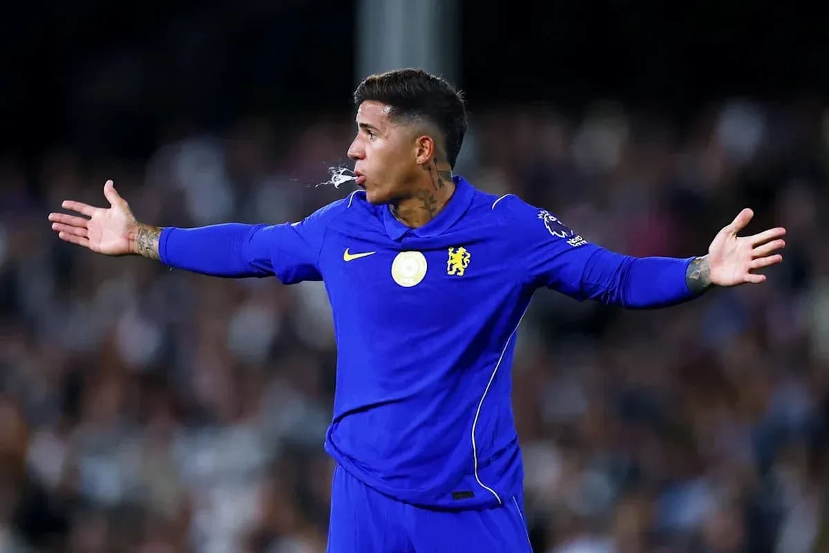 Player gesturing during a match in blue jersey