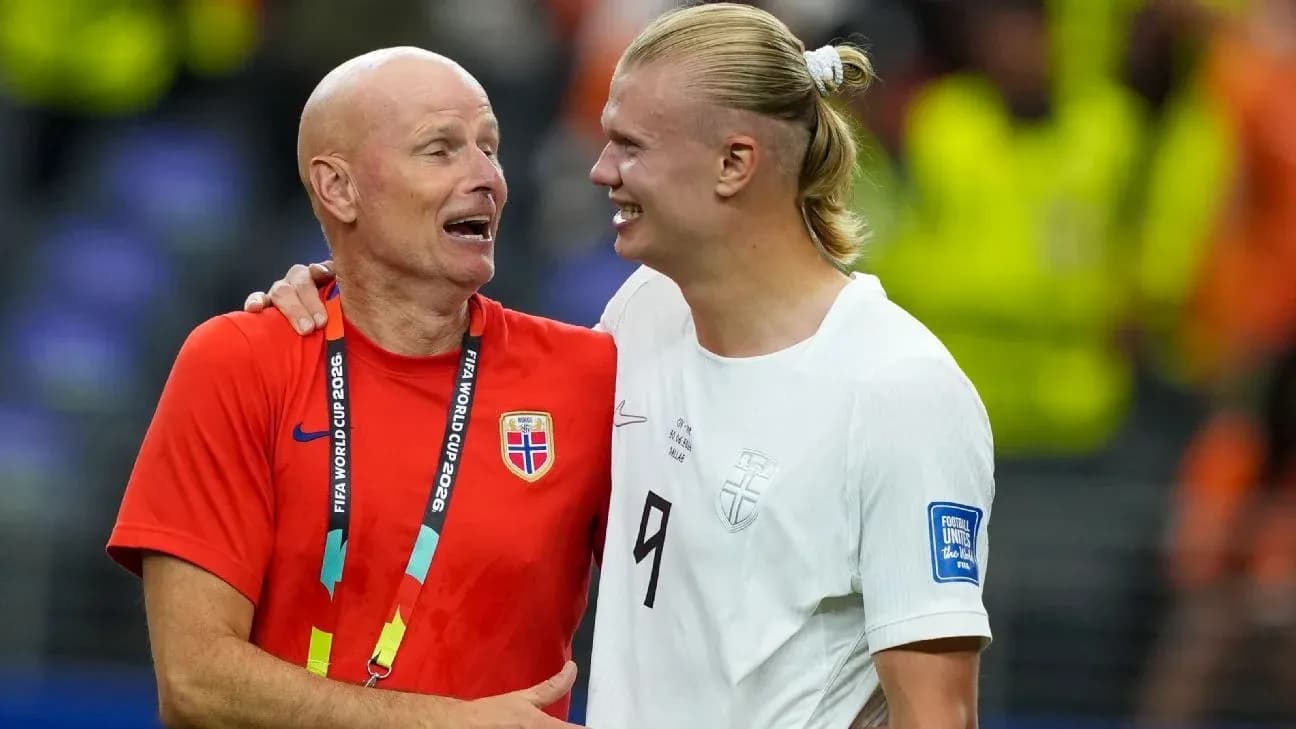 Coach and player celebrating after match together