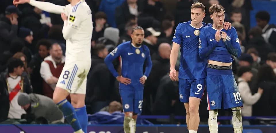 Chelsea players walking off the pitch after match