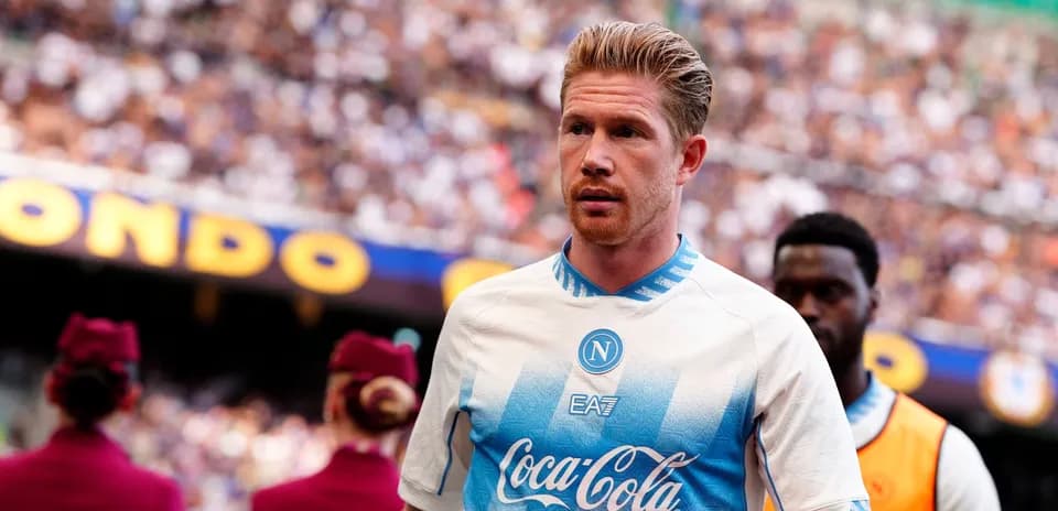 Player walking onto the pitch before the match
