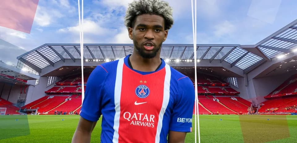 Player in PSG kit at Anfield stadium