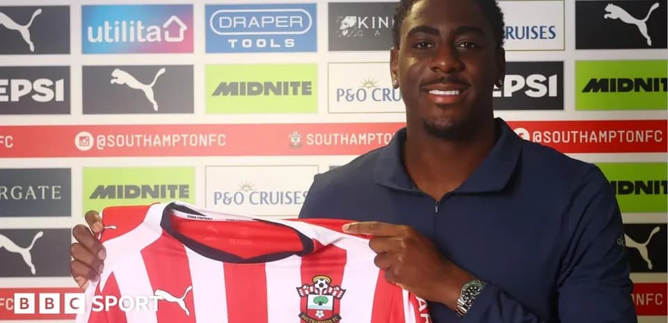 Player holding Southampton FC jersey during announcement