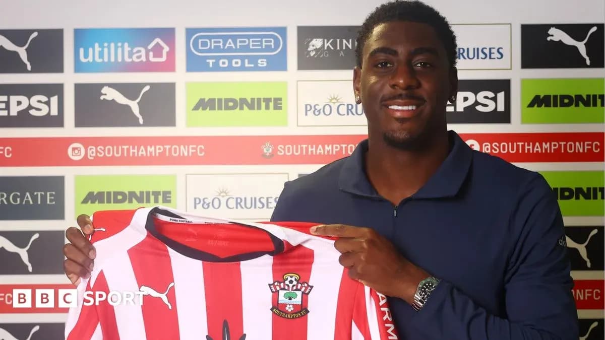 Player holding Southampton FC jersey during announcement