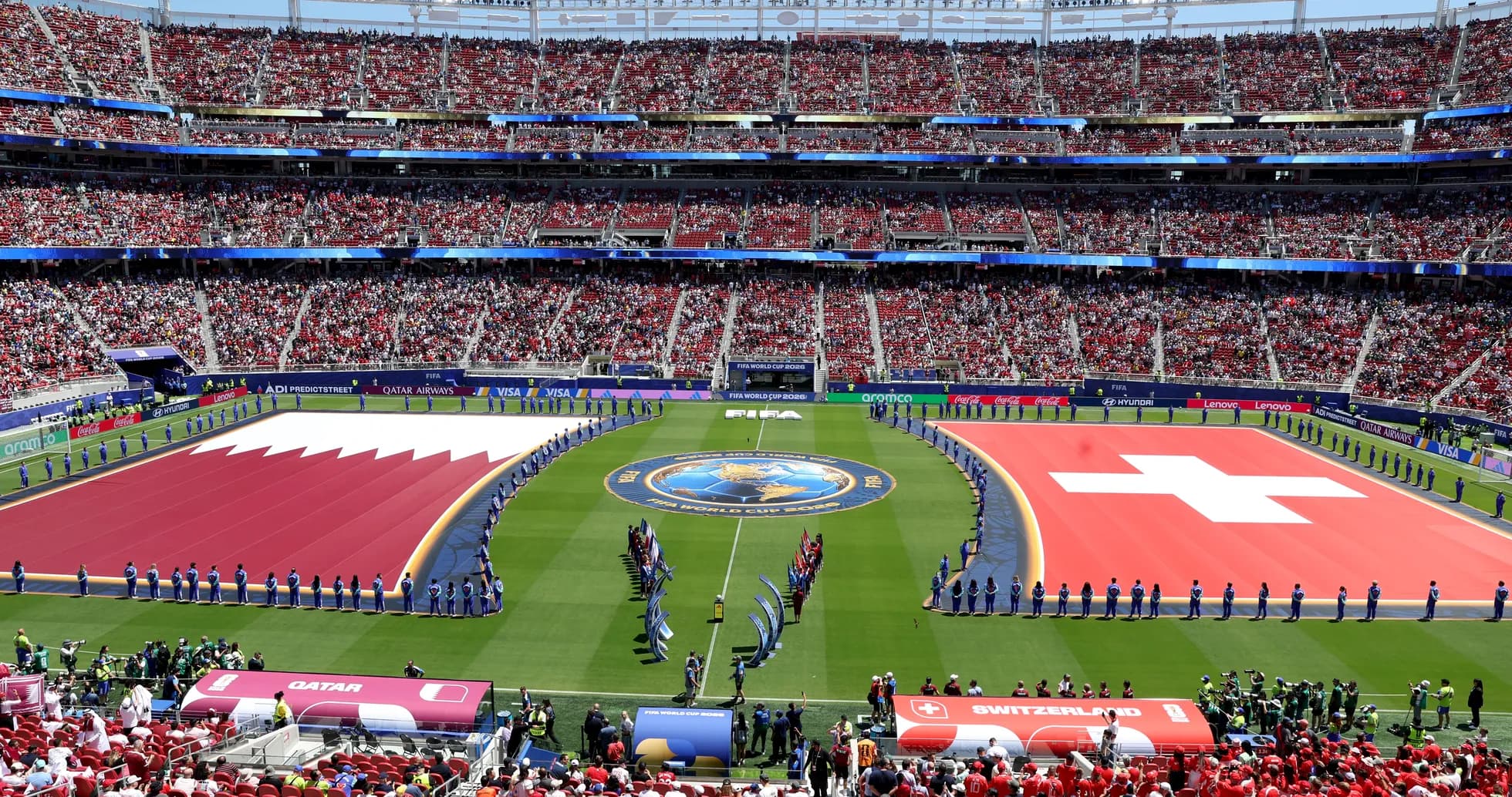 Qatar and Switzerland flags displayed during match
