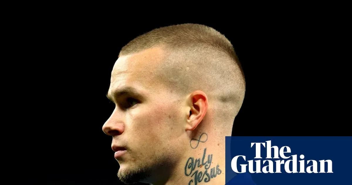 Profile of a player with a short haircut