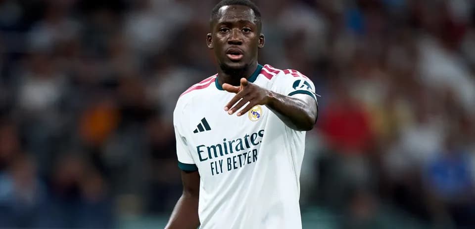 Player gesturing during a match for Real Madrid